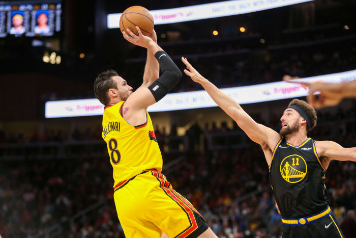 Mar 25, 2022; Atlanta, Georgia, USA; Atlanta Hawks forward Danilo Gallinari (8) shoots over Golden State Warriors guard Klay Thompson (11) in the second half at State Farm Arena.
